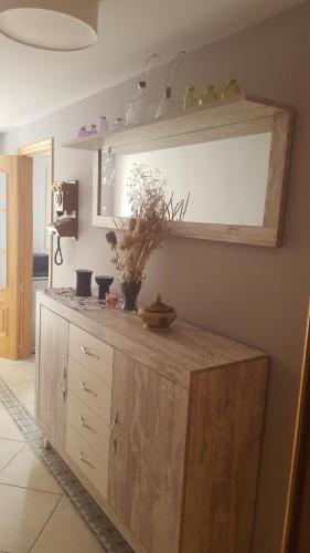 a kitchen with a wooden counter top in a room at Casa sol in Vélez-Málaga