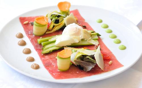 a plate of food on a white plate at Hotel Monte Rosa in Chiavari