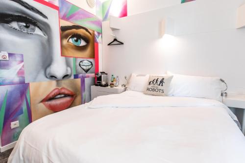 Ein Bett oder Betten in einem Zimmer der Unterkunft ibis Styles Lausanne Center MadHouse