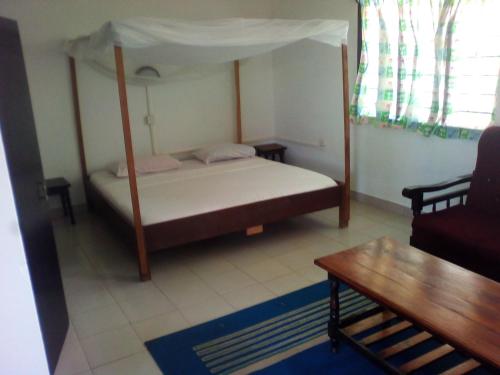 Кровать или кровати в номере Ashari Hotel