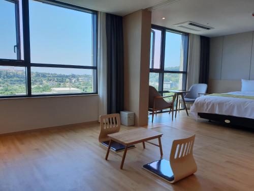Ένα ή περισσότερα κρεβάτια σε δωμάτιο στο Hotel Winstory