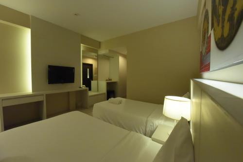 Trendy Hotelにあるベッド