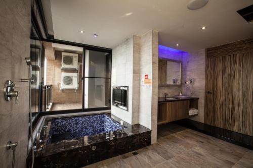 Kuchyň nebo kuchyňský kout v ubytování 覓玥精品時尚旅館 Mi Yue Boutique Motel