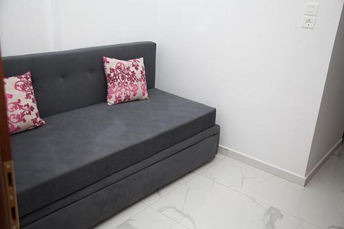 Cama ou camas em um quarto em Floral Studios