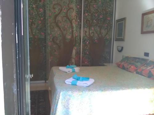 Posteľ alebo postele v izbe v ubytovaní L'impossibile Guesthouse