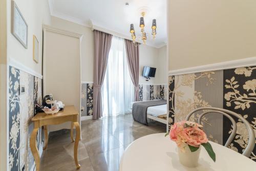 Letto o letti in una camera di Le Chiavi di Roma