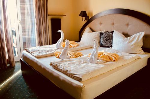 Postel nebo postele na pokoji v ubytování Panoramahotel Unterinnerhof