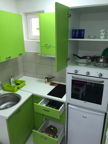 Kuchyň nebo kuchyňský kout v ubytování La Apartamento