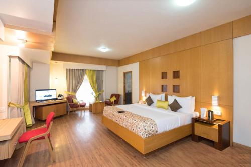 Ένα ή περισσότερα κρεβάτια σε δωμάτιο στο Meadows Residency