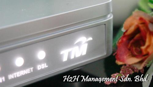 a close up of a digital clock with a flower at H2H - Euro House @ Majestic Ipoh (8~10 Guests) in Ipoh