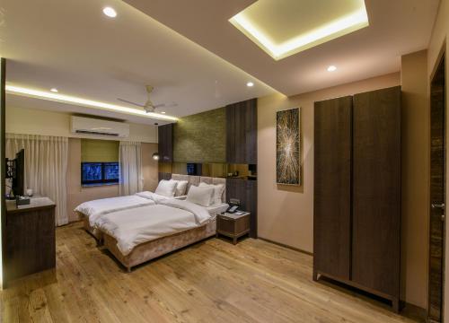 Voodi või voodid majutusasutuse Hotel Orient Regency toas