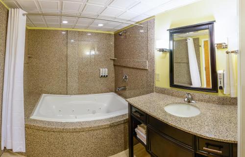 A bathroom at Asbury Inn & Suites