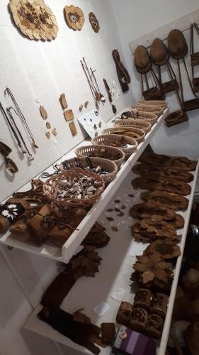 a display case with many different types of pastries at Lörincz Vendégház in Corund