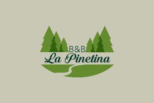 a logo of a forest with a road and the words bc la primina at La Pinetina in Soverato Marina