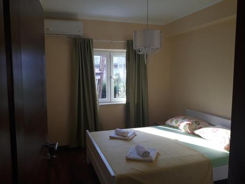 Ένα ή περισσότερα κρεβάτια σε δωμάτιο στο Apartmani Tanja