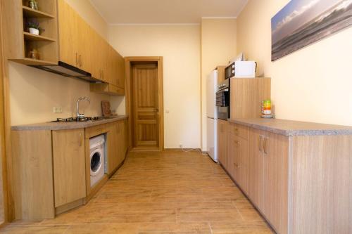 Kuchyň nebo kuchyňský kout v ubytování Vila Estate
