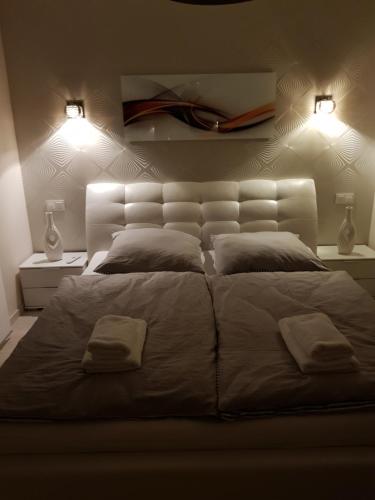 Krevet ili kreveti u jedinici u okviru objekta Haus am Jachthafen