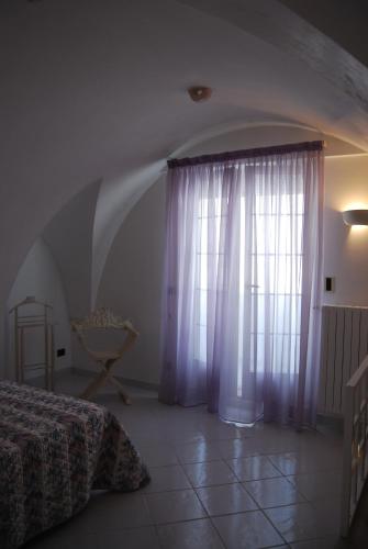 Postel nebo postele na pokoji v ubytování Borgo 124