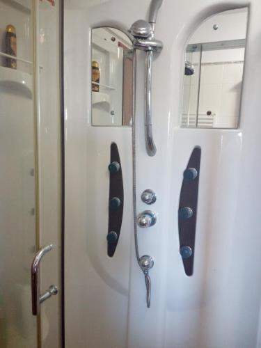 a door on a train with handles on it at B&B Leonida in Taranto
