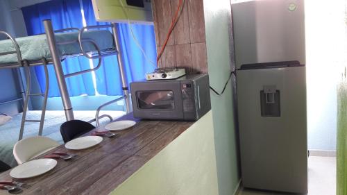 Η κουζίνα ή μικρή κουζίνα στο Hotel Casa Ceci Inn
