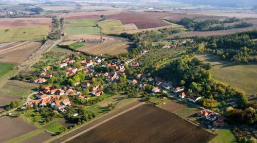 an aerial view of a village in a field at Apartmá Za kopcem in Boskovice