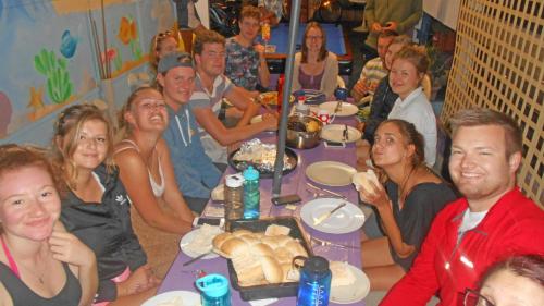a group of people sitting around a long table at Dolphin Retreat Bunbury in Bunbury