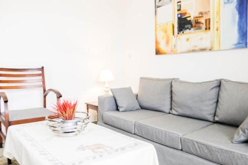 Ein Sitzbereich in der Unterkunft Tchero Appartement 1