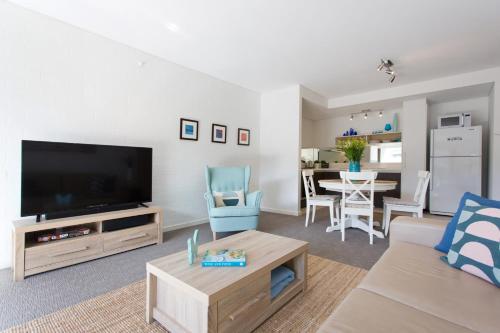 A television and/or entertainment center at Beachside Living - South Fremantle