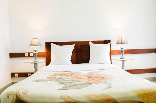 Ein Bett oder Betten in einem Zimmer der Unterkunft Tchero Appartement 1