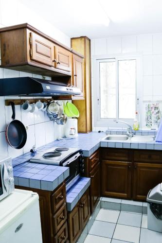 Küche/Küchenzeile in der Unterkunft Tchero Appartement 1