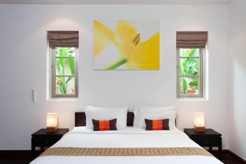 Ένα ή περισσότερα κρεβάτια σε δωμάτιο στο The Residence Resort