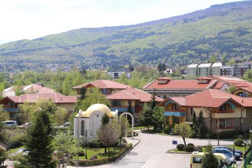 a small town with a lot of houses and trees at Tsarsko Selo Spa Hotel in Sofia