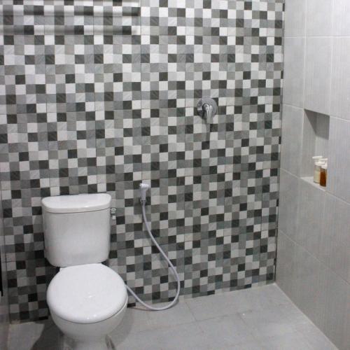 Ένα μπάνιο στο Rumah99