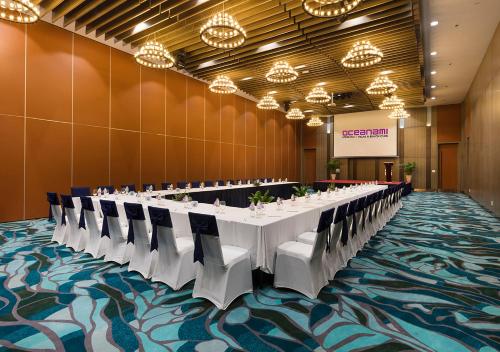 a large conference room with a long table and chairs at Oceanami Villas & Beach Club - Managed by Thang Long Group in Long Hai