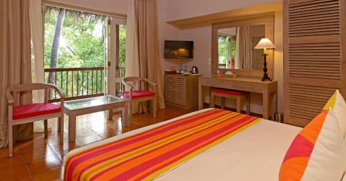 Adaaran Club Rannalhi - All Inclusive - 45 Minutes away from Male by Speedboatにあるベッド