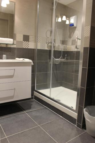 Ein Badezimmer in der Unterkunft Hotel le Sherpa