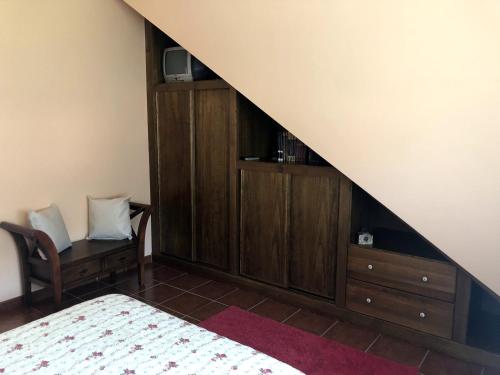 Ένα ή περισσότερα κρεβάτια σε δωμάτιο στο O Capricho