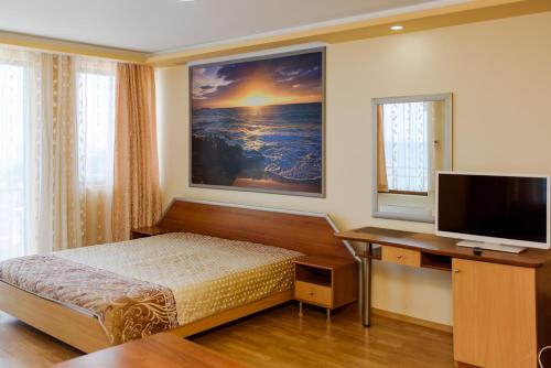 Guest House Ianis Paradise tesisinde bir odada yatak veya yataklar