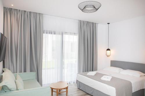 Postel nebo postele na pokoji v ubytování Suites Sole