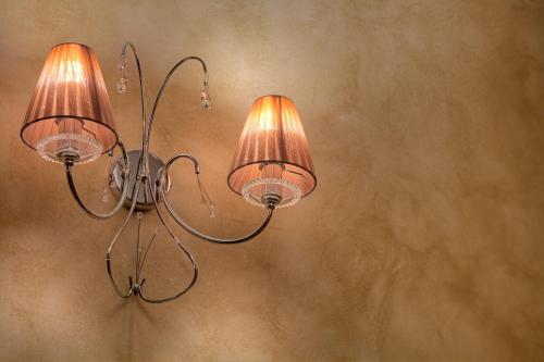 a pair of lights hanging on a wall at Résidence Les Balcons Platinium Val Thorens in Val Thorens