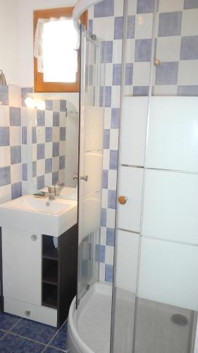 a bathroom with a shower and a sink at Station de montclar in Saint-Jean