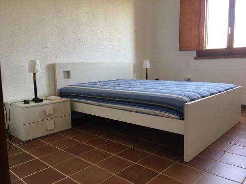 En eller flere senge i et værelse på Villa Sapphire 43