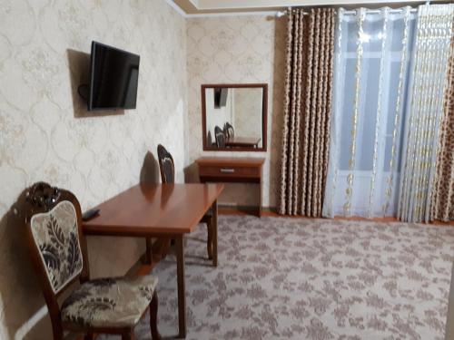 TV a/nebo společenská místnost v ubytování Hotel SUGD & Guest House