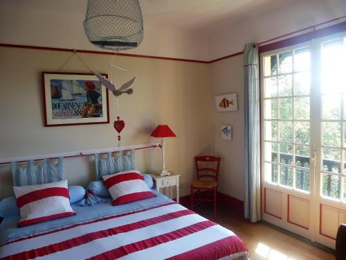 Ένα ή περισσότερα κρεβάτια σε δωμάτιο στο Villa La Croix Basque