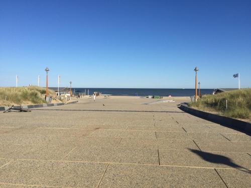 an empty parking lot next to the beach at Bed en Beach in Katwijk aan Zee