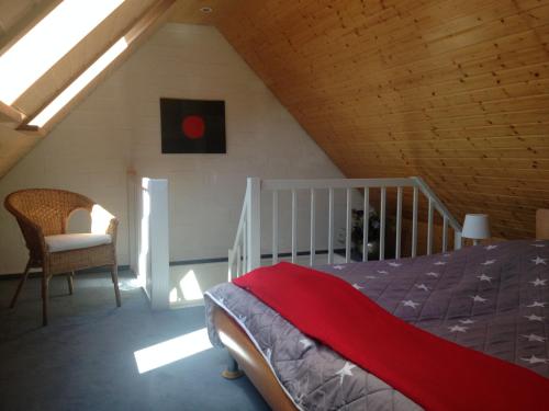 Кровать или кровати в номере Appartement Ginstertraum