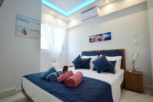 En eller flere senge i et værelse på Vista Luxury Suites Toroni Halkidiki 1BR