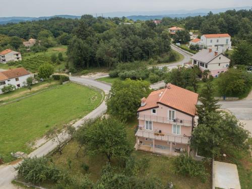 an aerial view of a house and a road at Middle Istra in Pazin