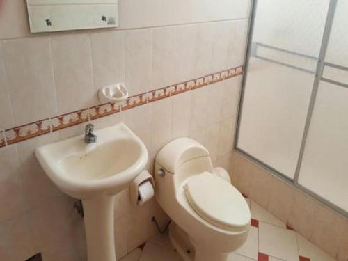 Koupelna v ubytování Hotel Arunta