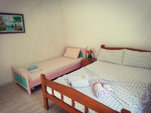 Postel nebo postele na pokoji v ubytování Piqeras Relax Guest House